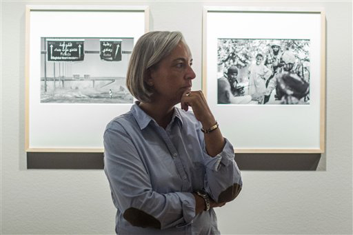 In this image taken Friday Sept. 11, 2011 AP photographer Anja Niedringhaus attends an exhibition of her work in Berlin. Niedringhaus, 48, was killed and an AP reporter was wounded on Friday, April 4, 2014 when an Afghan policeman opened fire while they were sitting in their car in eastern Afghanistan. Niedringhaus an internationally acclaimed German photographer, was killed instantly, according to an AP Television freelancer who witnessed the shooting. Kathy Gannon, the reporter, was wounded twice and is receiving medical attention. (Photo/Markus Schreiber)