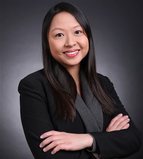 In this Jan. 10, 2016, photo, Gillian Wong poses for a photo in Beijing, China. Wong, a veteran journalist who has spent more than a decade reporting on China and elsewhere in Asia, has been named Greater China news director for The Associated Press. She will oversee coverage in video, text and photos, across a territory that includes the mainland, Taiwan and Hong Kong. (Photo via AP) 