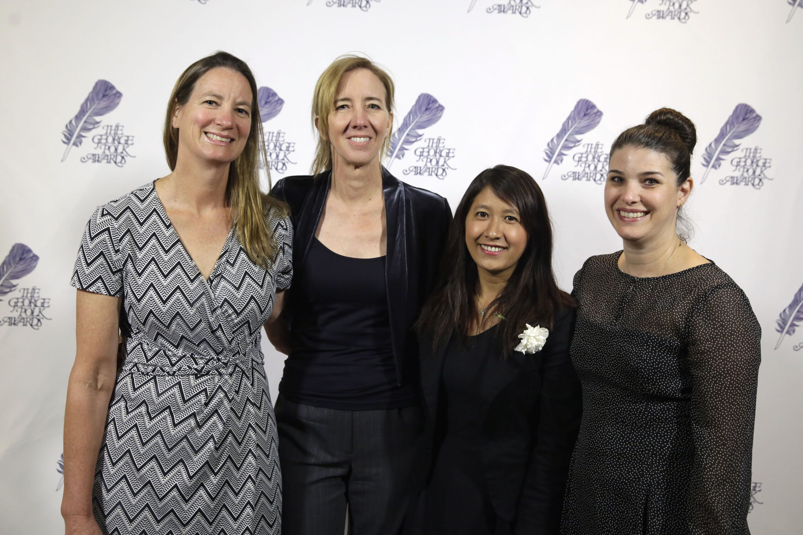 The AP team that investigated seafood caught by slaves poses at the George Polk Awards luncheon in New York,  Friday, April 8, 2016. From left: Martha Mendoza, Robin McDowell, Esther Htusan and Margie Mason. (AP Photo/Richard Drew)