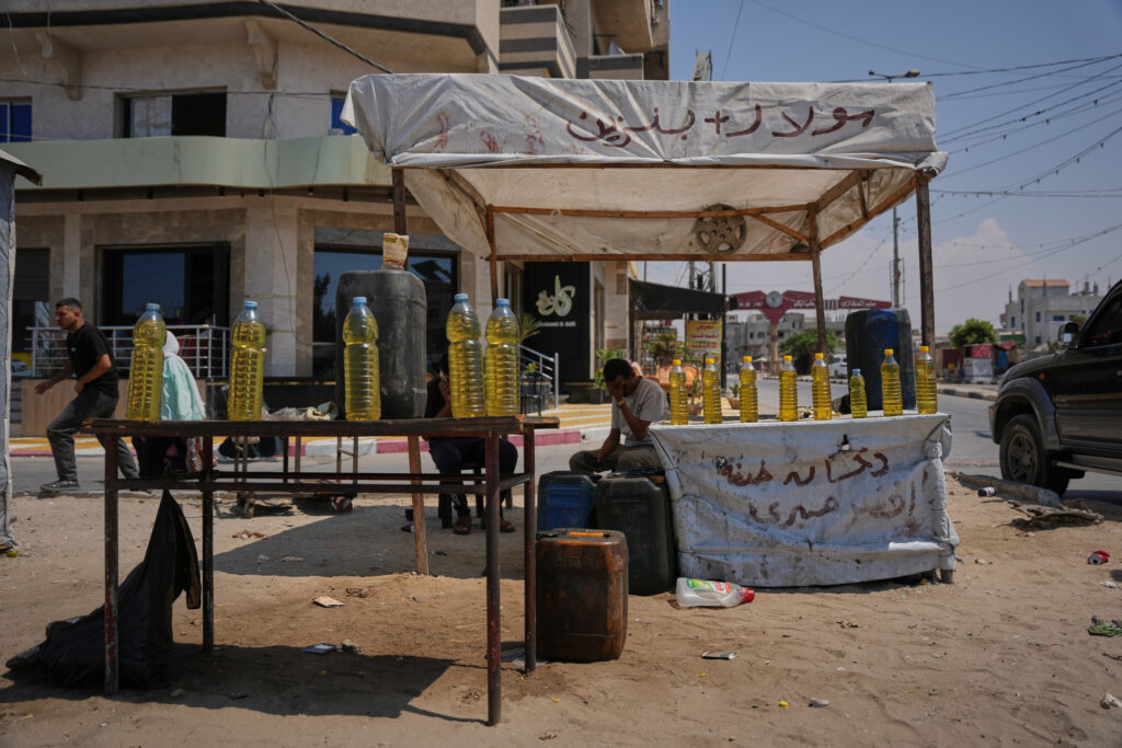 Groundbreaking source cultivation and shoe-leather reporting expose the lucrative, hidden economy of restricted goods entering Gaza