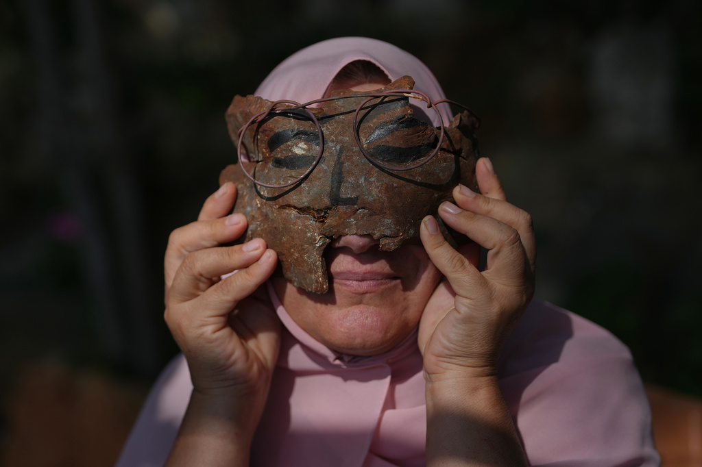Lebanese artist turns shrapnel from Israeli munitions into art, in ...