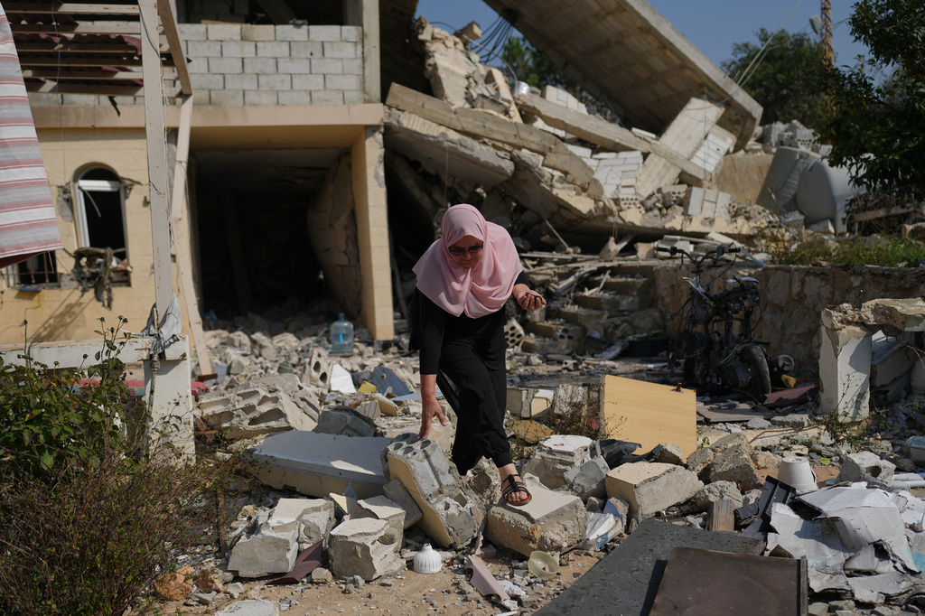 Lebanese artist turns shrapnel from Israeli munitions into art, in ...