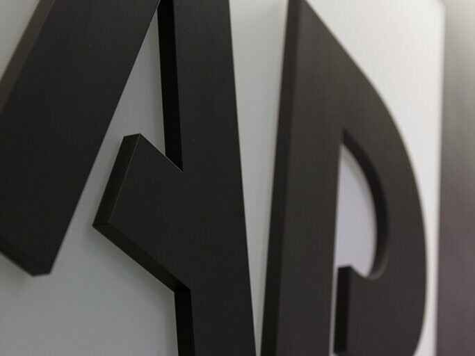 Earnings Associated Press