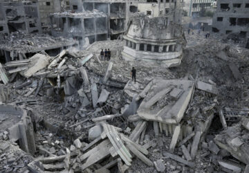 FILE - Palestinians inspect the rubble of the Yassin Mosque destroyed after it was hit by an Israeli airstrike at Shati refugee camp in Gaza City, early Monday, Oct. 9, 2023. Israel's military battled to drive Hamas fighters out of southern towns and seal its borders Monday as it pounded the Gaza Strip. (AP Photo/Adel Hana, File)