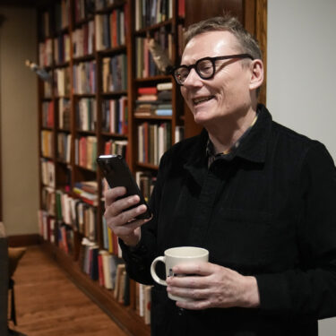 Nobel prize winner in Economics, James A. Robinson, gives an interview to the Associated Press from his home in the Hyde Park neighborhood of Chicago, Monday, Oct. 14, 2024. (AP Photo/Charles Rex Arbogast)