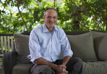 Economist Simon Johnson poses for a photograph after jointly winning the Nobel memorial prize in economics, at his home in Washington, Monday, Oct. 14, 2024. (AP Photo/Ben Curtis)