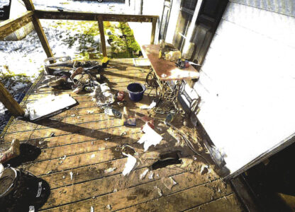 This image used as evidence shows the front porch where federal prosecutors say Chris Arthur hid a bomb at his home in Mount Olive, N.C. (U.S. District Court for the Eastern District of North Carolina via AP)