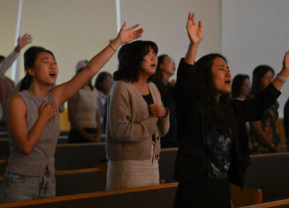 Parishioners pray during a service at the Christ Central Presbyterian Church, Sunday, Oct. 13, 2024 in Centreville. (AP Photo/John McDonnell)