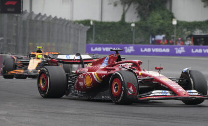 Charles Leclerc, of Monaco, steers his Ferrari followed by McLaren driver Lando Norris of Britain during the Formula One Mexico Grand Prix auto race at the Hermanos Rodriguez racetrack in Mexico City, Sunday, Oct. 27, 2024. (AP Photo/Fernando Llano)