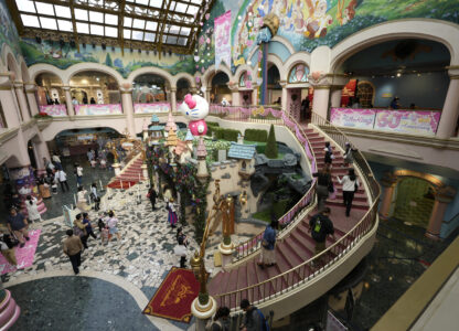 Hello Kitty fans visit Sanrio Puroland to celebrate its best known character's 50th birth anniversary, in Tama, a western suburb of Tokyo, Japan, Friday, Nov. 1, 2024. (AP Photo/Hiro Komae)