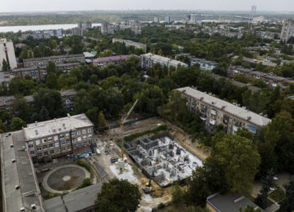 Construction workers dig out an underground school at Gymnasium No. 71 in Zaporizhzhia, Ukraine, Aug. 30, 2024, one of a dozen planned for the city and designed to be radiation- and bomb-proof. (AP Photo/Evgeniy Maloletka)