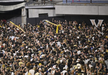 FILE - Vanderbilt fans carry a goalpost around the field after defeating Alabama in NCAA football game on Saturday, Oct. 5, 2024, in Nashville, Tenn. (AP Photo/John Amis, File)