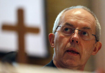 FILE - The Archbishop of Canterbury, Justin Welby, addresses the media during a press conference in Canterbury, England, Friday, Jan. 15, 2016. (AP Photo/Frank Augstein, File)