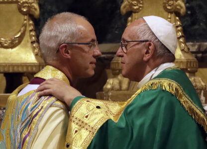 FILE - Pope Francis, right, greets the archbishop of Canterbury, Justin Welby, during vespers prayers in the church of San Gregorio al Celio, in Rome, Wednesday, Oct. 5, 2016. (AP Photo/Gregorio Borgia, File)