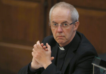 FILE - Archbishop of Canterbury Justin Welby as he listens to debate at the General Synod in London, Monday, Feb. 13, 2017. (AP Photo/Alastair Grant, File)