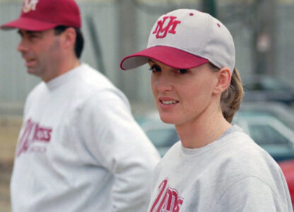 FILE - Massachusetts assistant baseball coach Julie Croteau watches the team during practice in Amherst, Mass., Feb. 28, 1995. (AP Photo/David Bruneau, File)