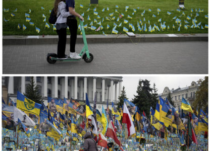 A combo of images showing at top, a couple riding a scooter in front of a handful of flags honoring fallen soldiers near Independence Square in Kyiv, Ukraine, Monday, May 23, 2022 and below a woman looking at the same memorial over two years later on Friday, Nov. 15, 2024. (AP Photo/Efrem Lukatsky, Natacha Pisarenko)