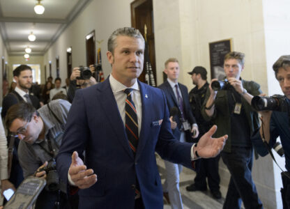 FILE - Pete Hegseth, President-elect Donald Trump's pick for secretary of defense, speaks with reporters following a meeting with senators on Capitol Hill, on Nov. 21, 2024, in Washington. (AP Photo/Rod Lamkey, Jr., File)