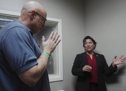 Border Patrol specialist Mitchell Holmes listens to instructor and chaplain Myrna Gonzalez during a training session, Wednesday, Nov. 20, 2024, in Dania Beach, Fla. (AP Photo/Marta Lavandier)