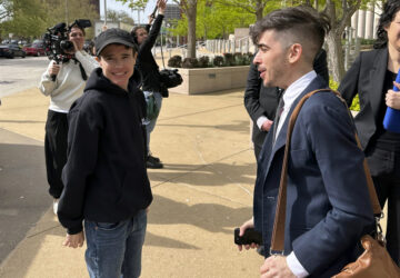 FILE - ACLU attorney Chase Strangio, right, and actor Elliot Page leave the 8th U.S. Circuit Court of Appeals after a hearing, April 11, 2024, in St. Louis. (AP Photo/Jim Salter, File)