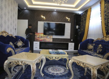 A man walks inside a luxury house in the city of Kabul, Afghanistan, Sept. 23, 2024. (AP Photo/Siddiqullah Alizai)