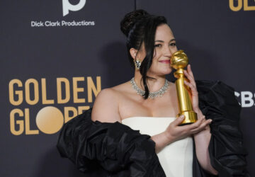 FILE - Lily Gladstone poses in the press room with the award for best performance by an actress in a motion picture, drama for 