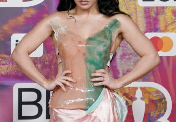 FILE - Charli XCX poses for photographers upon arrival at the Brit Awards 2024 in London, Saturday, March. 2, 2024. (Photo by Alberto Pezzali/Invision/AP, File)