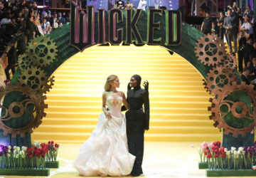 FILE - Ariana Grande, left, and Cynthia Erivo pose for the photographers prior to the the premiere of 