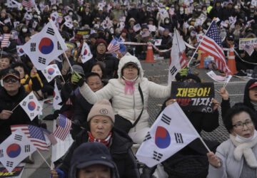 Supporters of South Korean President Yoon Suk Yeol rally in Seoul, South Korea, Thursday, Dec. 5, 2024. (AP Photo/Ng Han Guan)