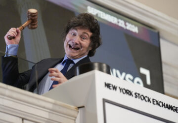 FILE - Argentina's President Javier Milei poses for pictures after ringing the opening bell at the New York Stock Exchange in New York, Sept. 23, 2024. (AP Photo/Seth Wenig, File)