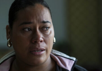 Larissa Martinez, who was deported from the U.S. in 2021 with her three children, reacts during an interview in San Pedro Sula, Honduras, Wednesday, Dec. 4, 2024. (AP Photo/Moises Castillo)
