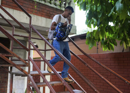 Honduran migrant Luis Miguel López, who was deported from the U.S., leaves the Mennonite Social Action Commission office in San Pedro Sula, Honduras, Tuesday, Dec. 3, 2024. (AP Photo/Moises Castillo)