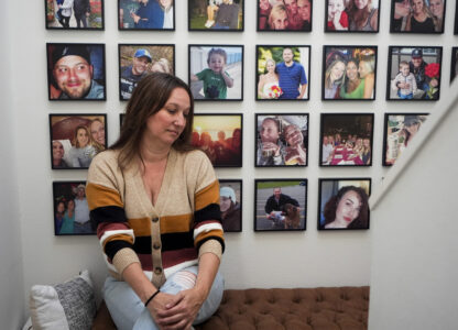 Jen Dold, whose brother, Alex Dold, lived with schizophrenia and died after a 2017 encounter with sheriff's deputies and police officers, sits for a portrait at her home Wednesday, Sept. 18, 2024, in Edmonds, Wash. (AP Photo/Lindsey Wasson)