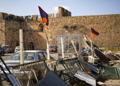 Armenian flags wave in a makeshift barricade set up by local activists in a parking area known as 