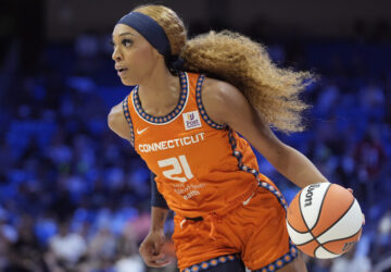 FILE - Connecticut Sun guard DiJonai Carrington drives during the first half of a WNBA basketball basketball game against the Dallas Wings in Arlington, Texas, on June 15, 2024. (AP Photo/LM Otero, File)