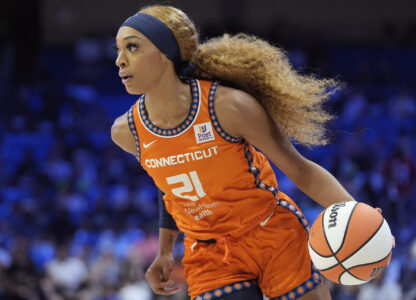 FILE - Connecticut Sun guard DiJonai Carrington drives during the first half of a WNBA basketball basketball game against the Dallas Wings in Arlington, Texas, on June 15, 2024. (AP Photo/LM Otero, File)
