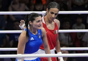 FILE - Algeria's Imane Khelif, right, looks at Italy's Angela Carini, following their women's 66kg preliminary boxing match at the 2024 Summer Olympics, Thursday, Aug. 1, 2024, in Paris, France. (AP Photo/John Locher, File)