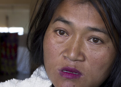 CORRECTS PLACE- A Kuki tribal woman Phalneivah Khonsai, 35, talks to Associated Press in a relief camp in Kangpokpi, Manipur, Monday, Dec. 16, 2024. Khonsai ran for her life when violence struck her neighbourhood in India's restive northeast, carrying just the bare essentials in the hope that her family would return soon. Khonsai, her husband and three children left behind their house, which was torched by a mob, and made for the hills where thousands of people from their community were heading for safety. (AP Photo/Rishi Lekhi)