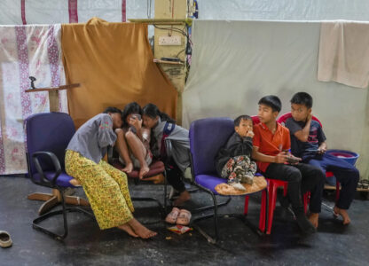 Kuki tribal children sit in a relief camp in Kangpokpi, Manipur, Sunday, Dec. 15, 2024. (AP Photo/Anupam Nath)