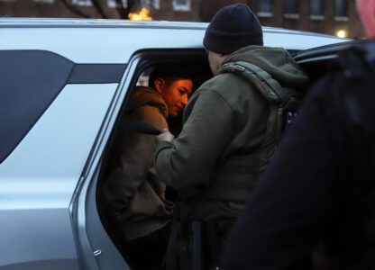 Deportation officers with Enforcement and Removal Operations in U.S. Immigration and Customs Enforcement's New York City field office arrest Wilmer Patricio Medina-Medina during an early morning operation, Tuesday, Dec. 17, 2024, in the Bronx borough of New York. (AP Photo/Julia Demaree Nikhinson)
