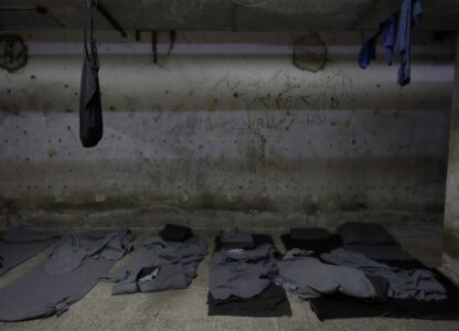Blankets used by prisoners as mattresses are seen at Branch 215, a detention facility run by military intelligence during Bashar Assad's regime in Damascus, Syria, on Dec. 17, 2024. (AP Photo/Hussein Malla)