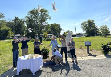 White doves are released on Aug. 29, 2024, in Westfield, Indiana, during the dedication of a memorial to the nine known victims of suspected serial killer Herbert Baumeister. (AP Photo/Rick Callahan)
