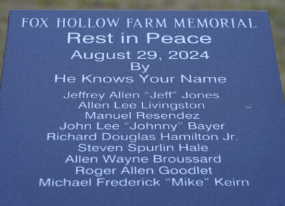 The name of Allen Livingston is seen on a memorial, Thursday, Dec. 26, 2024, in Westfield, Ind. (AP Photo/Darron Cummings)