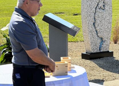 Hamilton County Coroner Jeff Jellison stands on August 29, 2024, in Westfield, Indiana, during the dedication of a memorial honoring suspected serial killer Herbert Baumeister's nine known victims. (AP Photo/Rick Callahan)