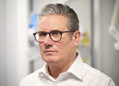 Britain's Prime Minister Keir Starmer visits a healthcare provider to deliver remarks on reducing NHS wait times, in Surrey, England, Monday, Jan. 6, 2025, (Leon Neal/Pool Photo via AP)