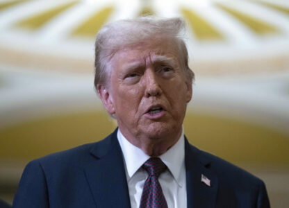 President-elect Donald Trump talks to reporters after a meeting with Republican leadership at the Capitol on Wednesday, Jan. 8, 2025, in Washington. (AP Photo/Jose Luis Magana)