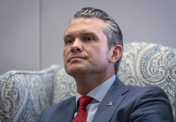 FILE - Pete Hegseth, President-elect Donald Trump's nominee to be defense secretary, responds to reporters during a meeting at the Capitol in Washington, Dec. 5, 2024. (AP Photo/J. Scott Applewhite, File)