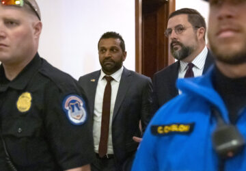 FILE - Kash Patel, President-elect Donald Trump's pick to be the director of the FBI, walks between meetings on Capitol Hill, Dec. 9, 2024, in Washington. (AP Photo/Mark Schiefelbein, File)