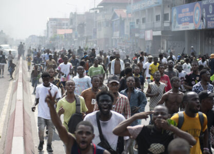 People protest in Kinshasa, Democratic Republic of the Congo Tuesday, Jan. 28, 2025, against the Rwanda-backed M23 rebels' advances into eastern Congos capital Goma.(AP Photo/Samy Ntumba Shambuyi)