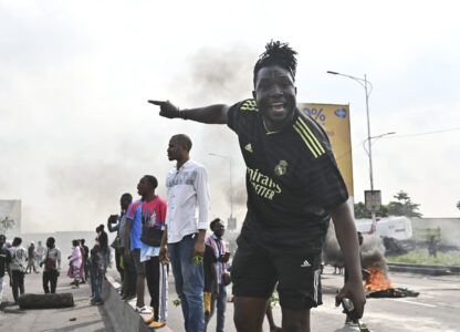 People protest in Kinshasa, Democratic Republic of the Congo Tuesday, Jan. 28, 2025, against the Rwanda-backed M23 rebels' advances into eastern Congos capital Goma.(AP Photo/Samy Ntumba Shambuyi)